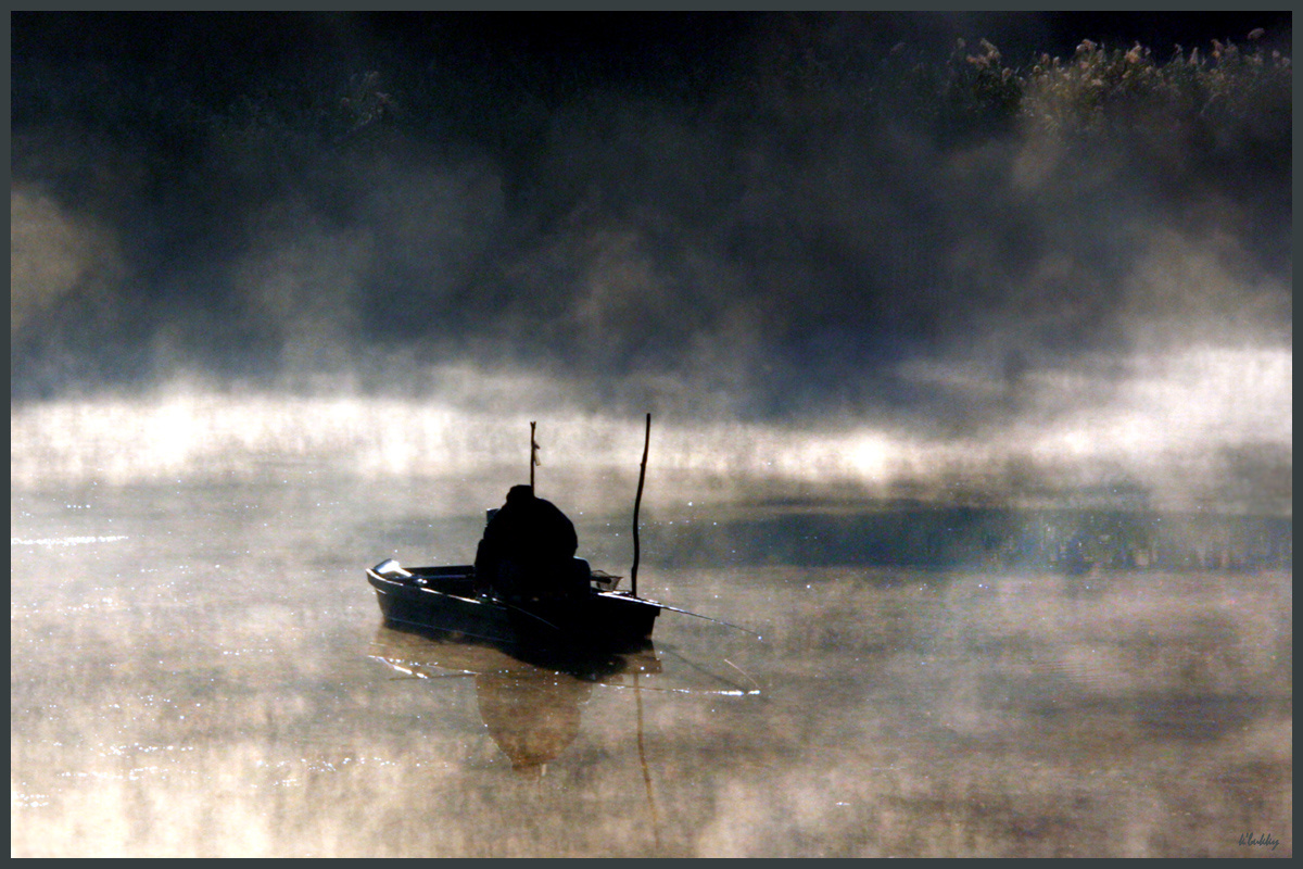 csónakos a ködben